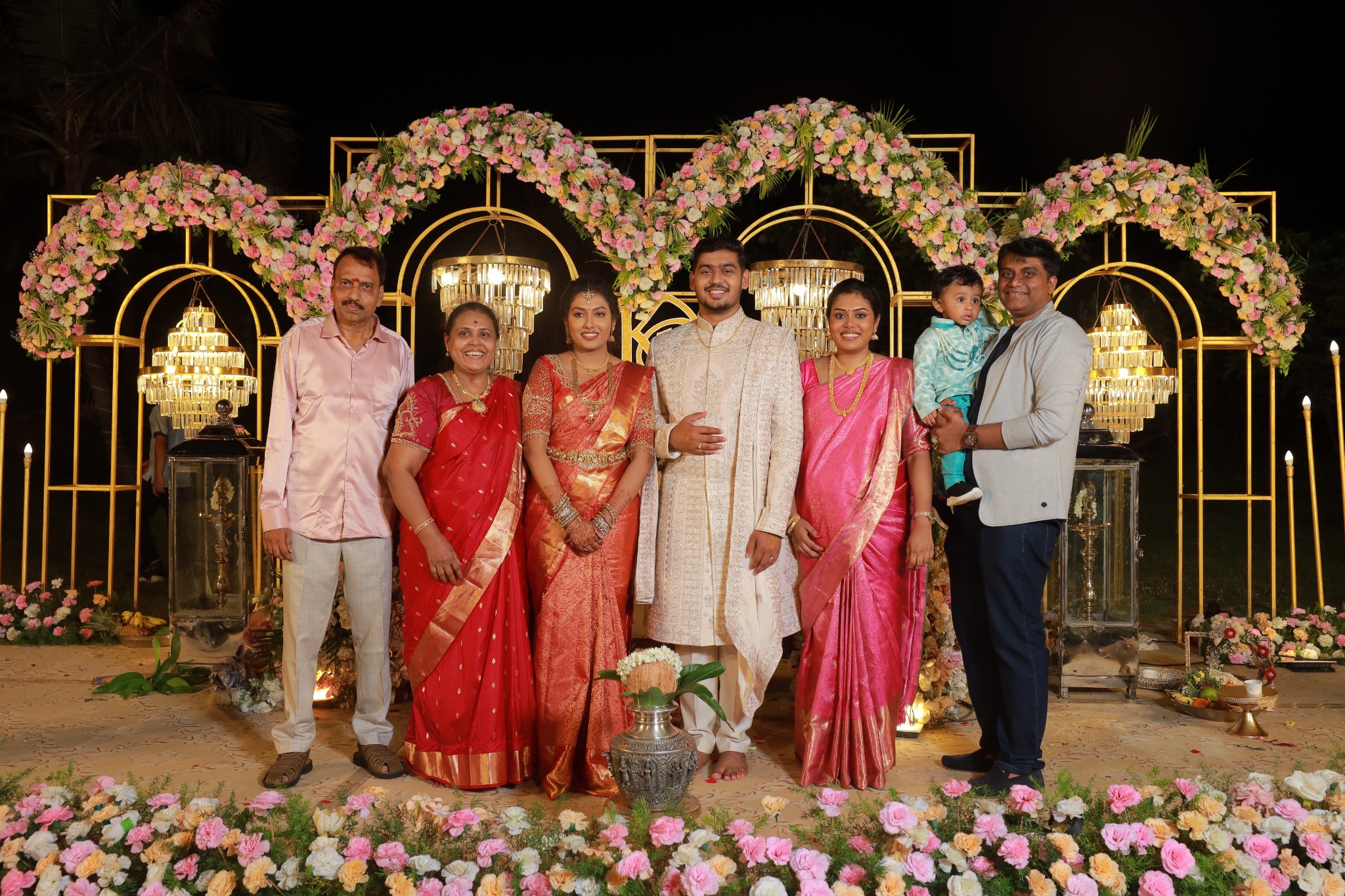Karthik and Priya sharing a joyful family moment